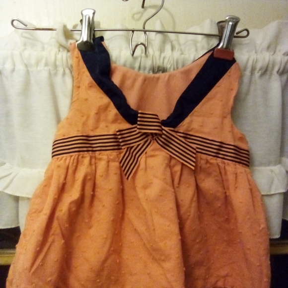 3 outfits - 2 Girls dresses and 1 long sleeve onesie... size 2t,24 mo, 12 mo. - Picture 2 of 10